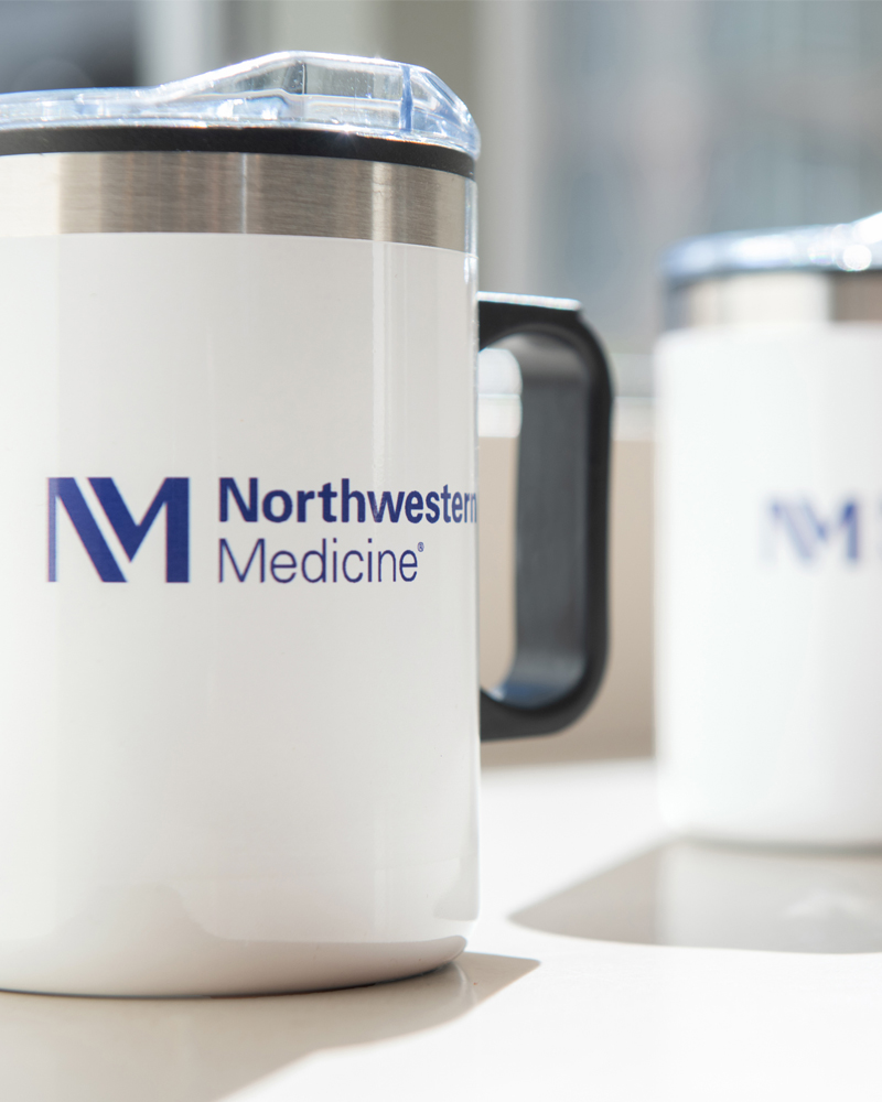 Northwestern Medicine branded coffee mugs and tumblers